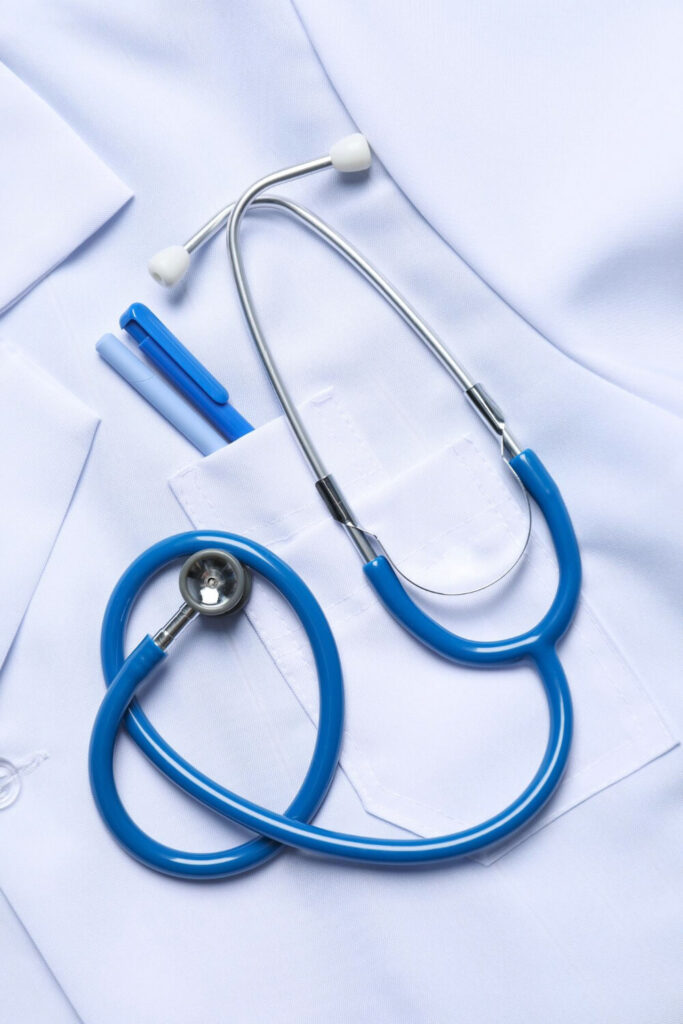 Medical stethoscope on a health worker's coat