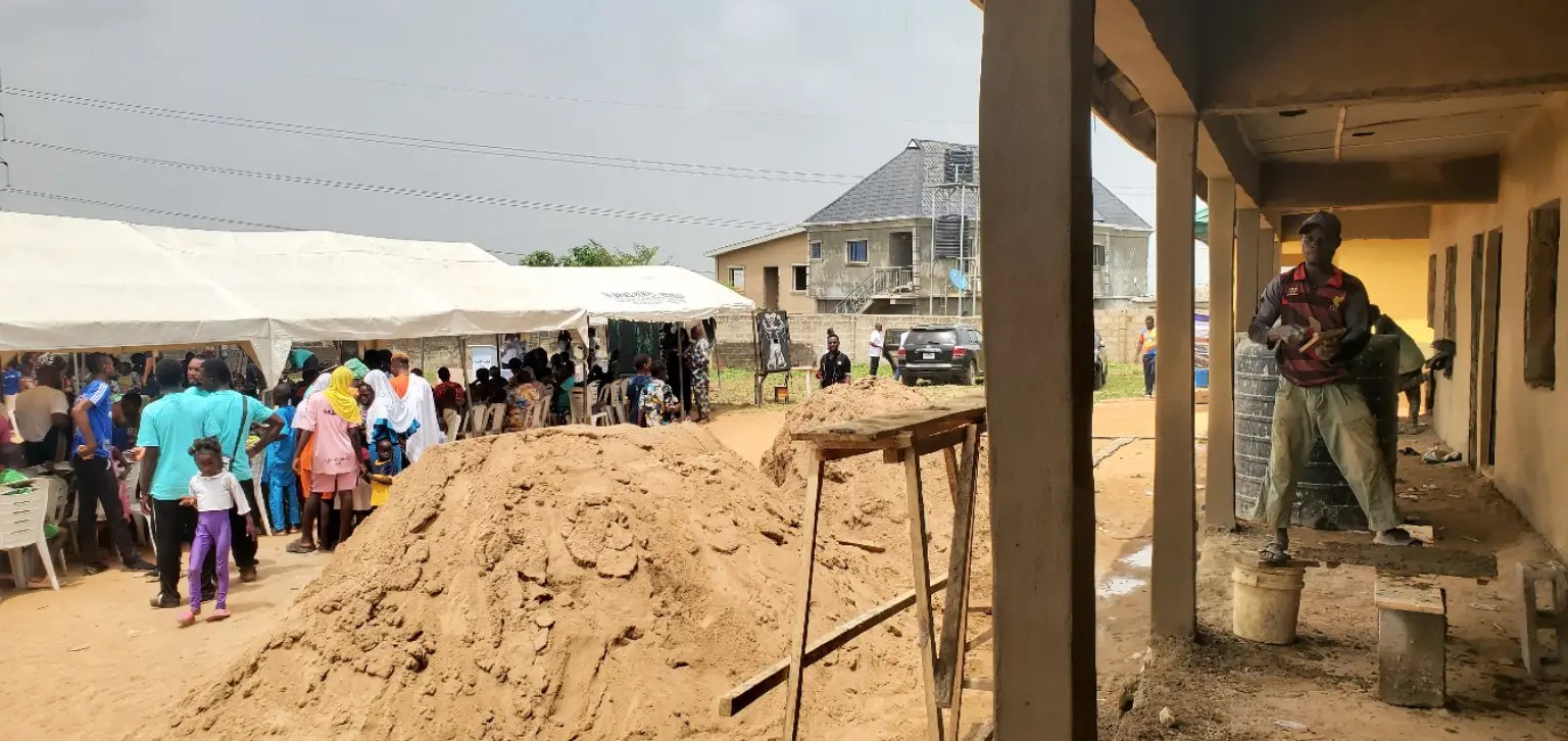 Families gathering at an outreach